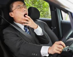 Driver yawns while behind the wheel